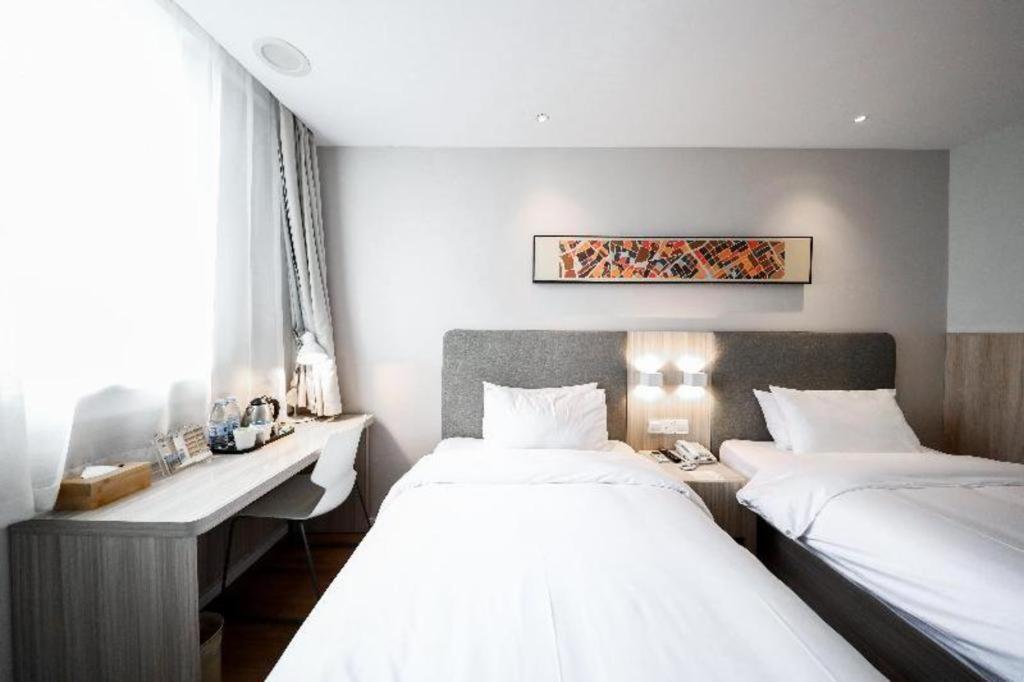 Hanting Hotel Shanghai Songjiang Bagian luar foto
