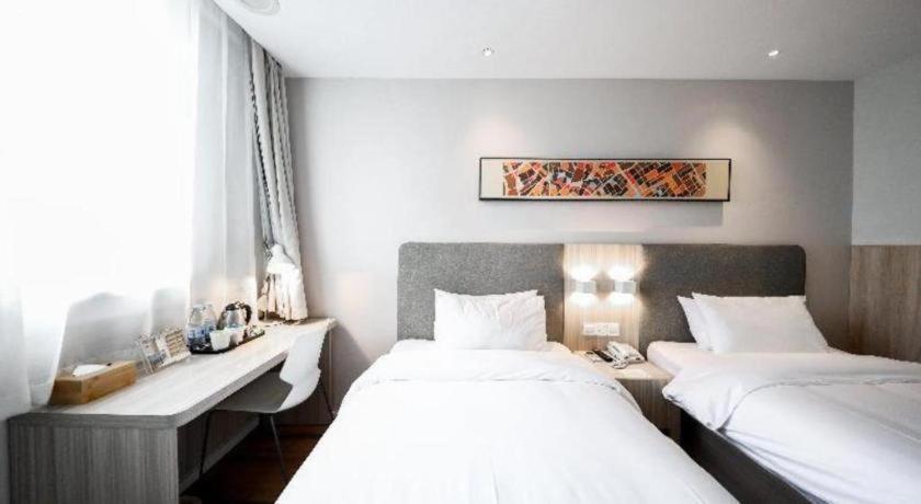 Hanting Hotel Shanghai Songjiang Bagian luar foto